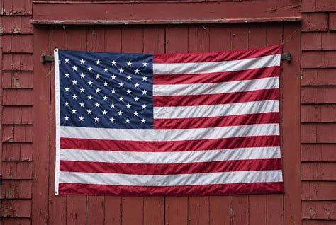 How To Hang A Flag On A Wall Easy Steps To Hang A Flag Howto