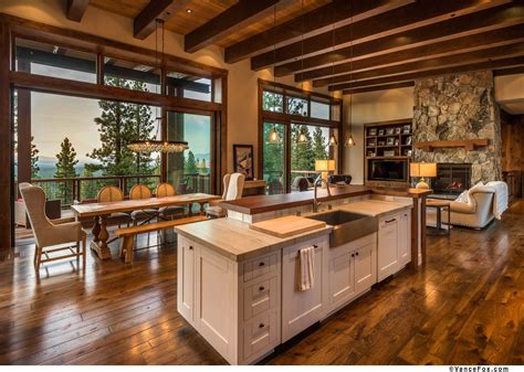 The open floor plan encourages convenience with an organic flow between the kitchen, dining, and living room. mc 550 — walton architecture + engineering | Rustic house ...