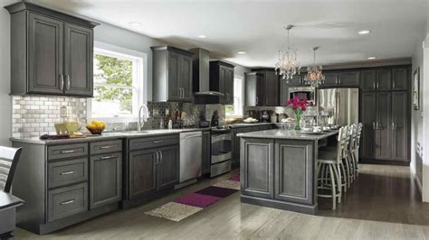 Thinking of painting your kitchen cabinets gray? Cabinets table kitchen black cabinets gel stain grey ...