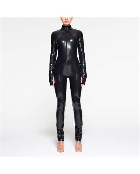 Skims Zip Front Catsuit Bodysuit In Black Lyst