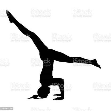 Female Silhouette In A Split Leg Variation Of The Fallen Angel Pose