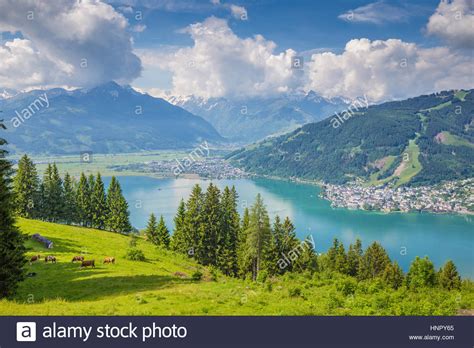 Beautiful Scenery In The Alps With Clear Lake And Green