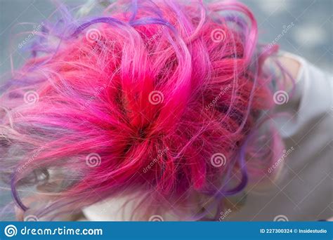 Close Up Portrait Of Curly Caucasian Woman With Multi Colored Hair