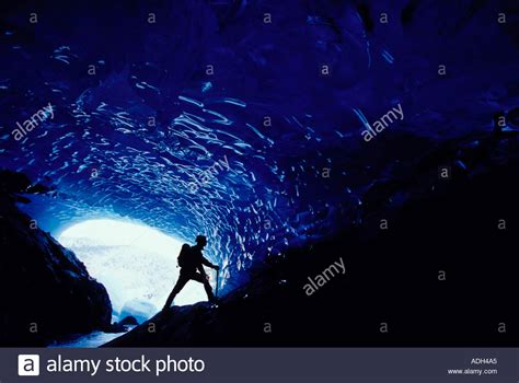 Man Exploring Ice Cave Mendenhall Glacier Se Alaksa Stock Photo Alamy