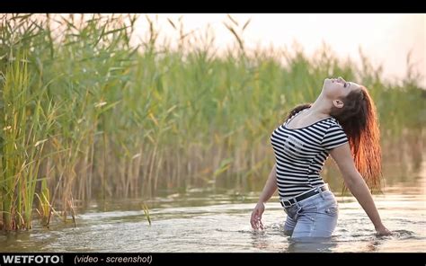 Hot Girl In Wet Striped T Shirt And Tight Jeans Swim On The Lake Wetlookone