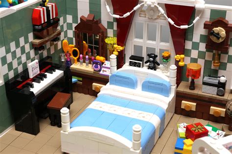 An idea for simplistic modern living room furniture existing of a small table, big screen tv, sofa , tv setup box and salon table. MOC Dream House - Special LEGO Themes - Eurobricks Forums