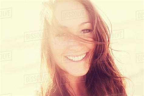 Portrait Of Smiling Woman Stock Photo Dissolve