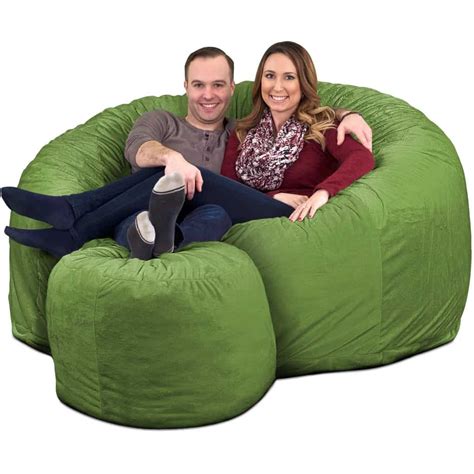 This giant bean bag is big enough for two adults and is perfect for lounging around in your living room, game room, dorm room or home theater. Ultimate Sack 6000 Giant Bean Bag Chair w/ Footstool ...