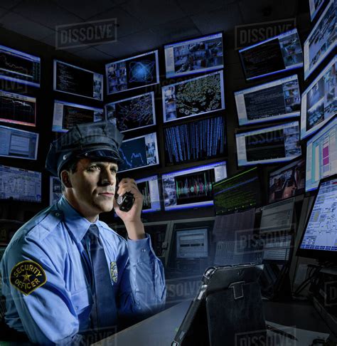 Police Officer Working In Control Room Stock Photo Dissolve