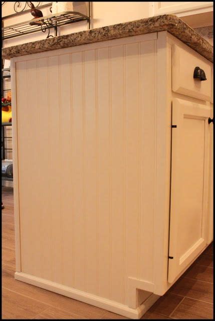 Use a jigsaw to cut out the door center, then use a router to create a lip or ledge on the back of the door to hold the fabric. Add bead board to the ends of cabinets!! | Wainscoting kitchen, New kitchen cabinets, Kitchen ...