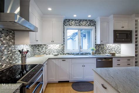 If you're looking for something that is a bit more chic, light grey quartz countertops might just do the trick. Transitional Granite and Quartz Grey Scale Kitchen- Villanova, PA - MacLaren Kitchen and Bath