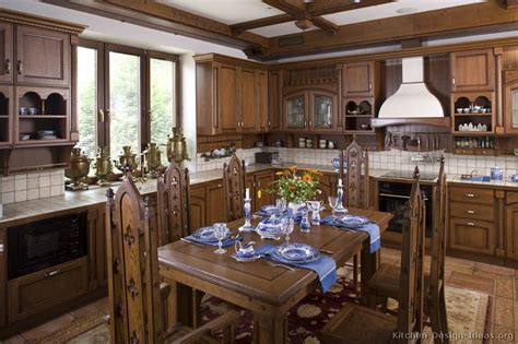 Beautiful old world kitchen with elegant backsplash. Old World Kitchen Designs - Photo Gallery