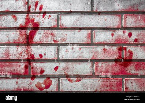 Bloody Handprints And Blotches Of Blood On Grunge Wall Background