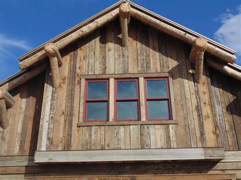 Rustic Wood Hubs Reclaimed Barn Siding Adorns This Gable Barn