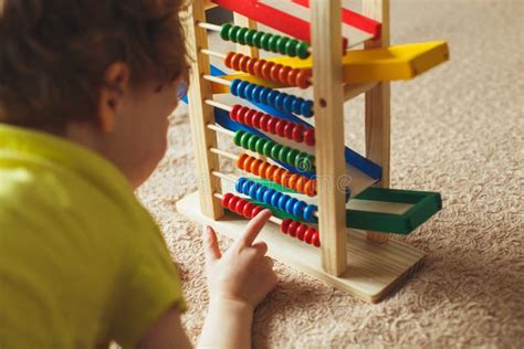 Preschooler Baby Learns To Count Cute Child Playing With Abacus Toy