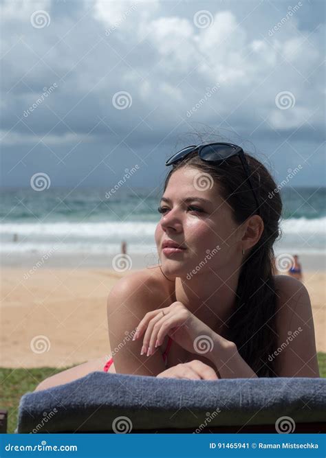 girl sunbathing on a lounger stock image image of exotic relaxation 91465941