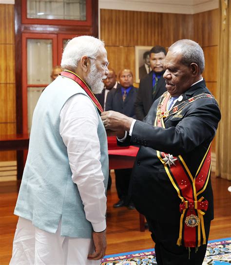 Pm Confers With The Highest Civilian Award Of Papua New Guinea Prime
