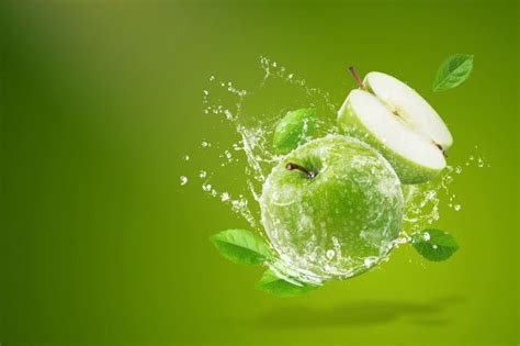 Water Splashing On Fresh Green Apple On Green Background Green Apple