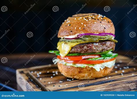 Close Up Delicious Fresh Burger On Wooden Board Stock Photo Image Of