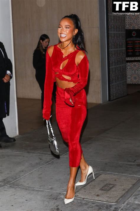 karrueche tran shows her pokies in a red dress at the hollywood reporter s oscar nominees night