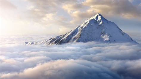 Snow Covered Mountaintop Above Clouds E6968e8bc943ee1983a64cb4f469aee8