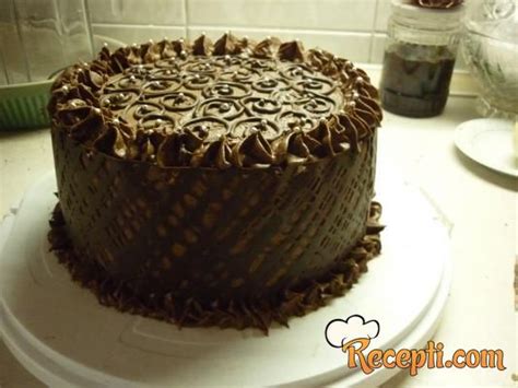 Ova posna torta se može seći na komade kada se glazura osuši. Posna torta sa čokoladom i višnjama - Recepti.com
