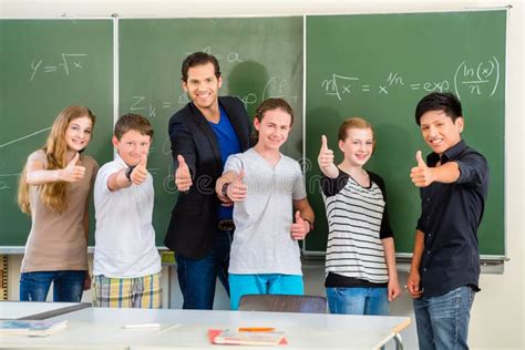 Teacher Motivating Students In School Class Stock Image Image Of