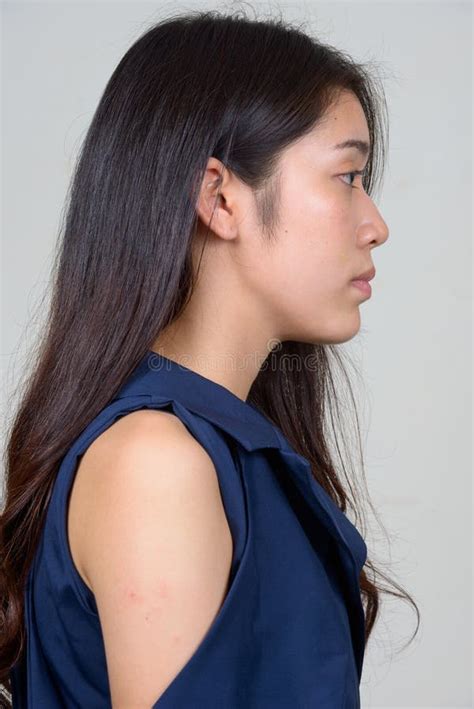 Closeup Profile View Of Young Beautiful Asian Businesswoman Stock Image
