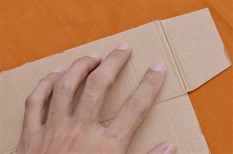 Or in other words, the surface depression can be evened out by carefully cutting out and lifting the piece of green carpet over the indentation and sweeping. 4 Ways to Flatten a Box - wikiHow