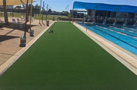 Check Out This Synthetic Turf Installation Around The Twin Towns Pool