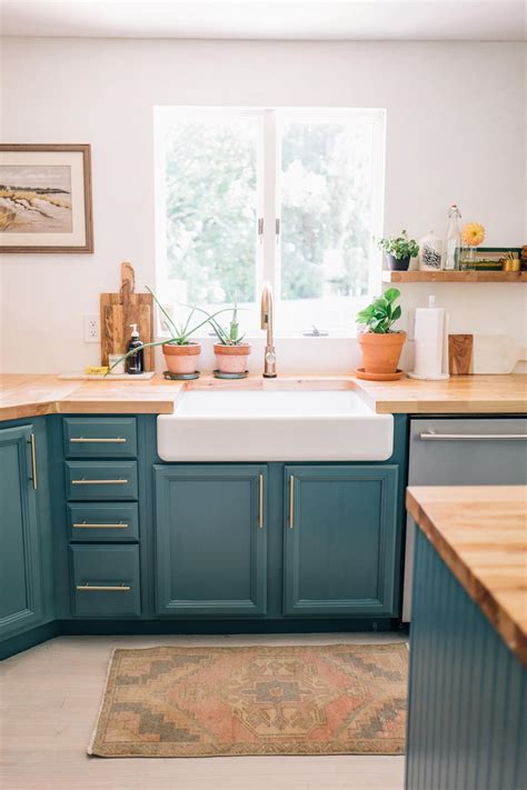 Our clients had a wealth of china and glassware to show off and take full advantage of glazed cabinetry. Our Kitchen: A Year Later | Jess Ann Kirby
