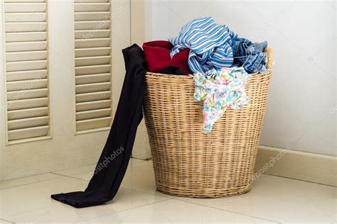 Pile Of Dirty Clothes In A Washing Basket Stock Photo By ©ezthaiphoto