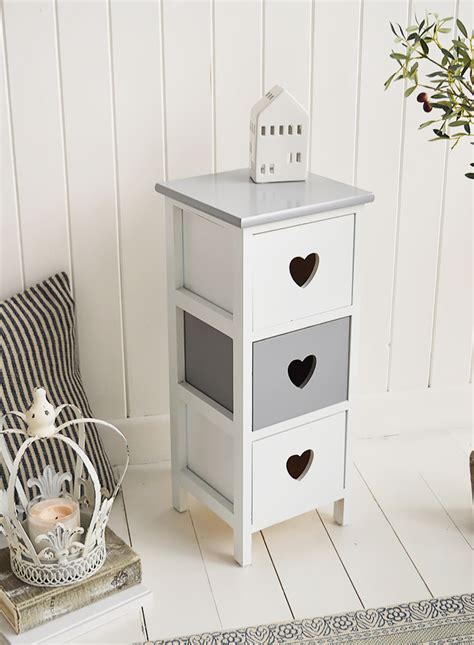 Horton is flexing a few small space design secrets. Sweetheart Narrow Grey and White Bedside Table