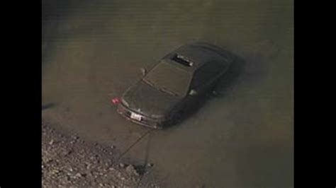 Police Work To Id Body Found In Submerged Car