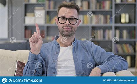 Portrait Of Man Saying No With Finger Sign Stock Image Image Of