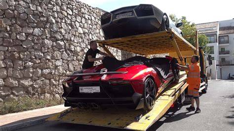 Watch Rare Lamborghini Aventador J And Reventon Roadster Get Delivered