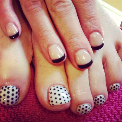 White and black polka dot gel toes with nude, modern black French tips
