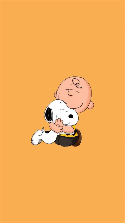 Download Cute Charlie Brown Hugging Snoopy Wallpaper