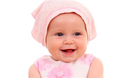 Smiley Cute Baby Girl Is Wearing Pink Dress And Cap In White Background