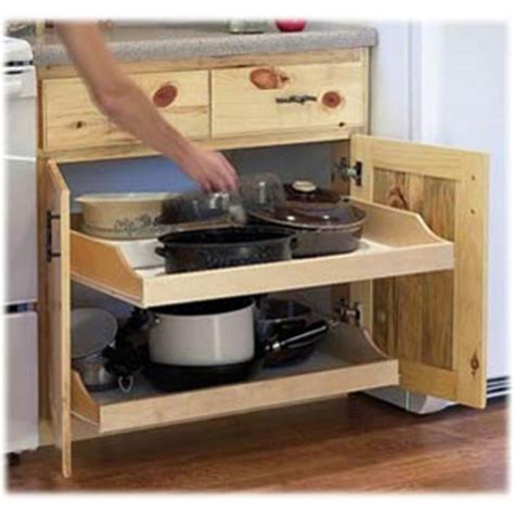 Like undermount slides, they are totally concealed, but instead of being mounted under both sides of the drawer, a single slide runs down. Kitchen Cabinet Slide Out Shelves | Newsonair.org