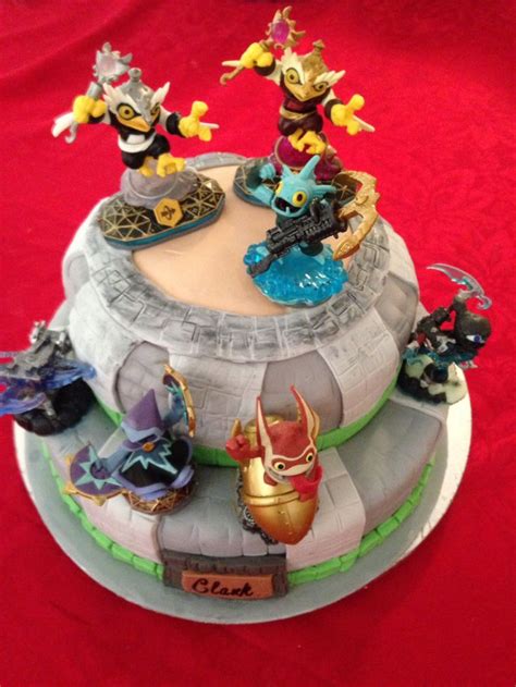 An Elaborately Decorated Cake With Figurines On Top