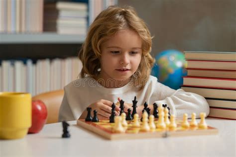 Early Development Boy Thinking About Chess The Concept Of Learning