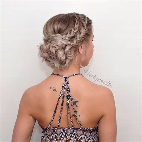 This is an example of a french braid that has been morphed into a mess of spiraling braids that form a complex labyrinth of hair. 25 Chic Braided Updos for Medium Length Hair - Hairstyles ...