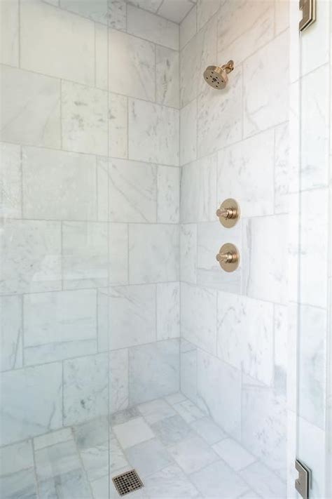 Large Square Marble Wall Tiles In A Transitional Shower Delivers A