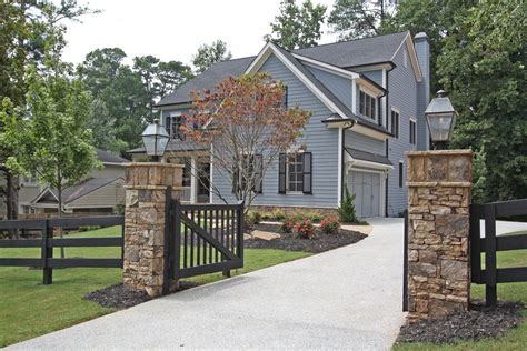 Stone Columns And Fence Driveway Entrance Stone Driveway Driveway