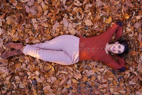 Size Plus Woman Lying On Fallen Leaves Stock Photo Image Of Candid