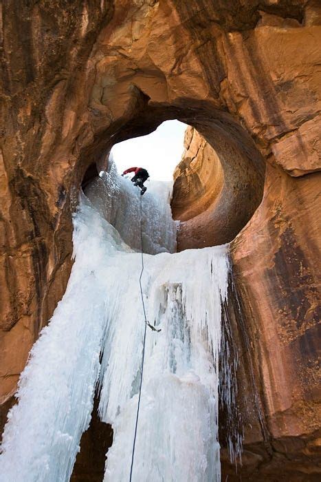 Ralph Ferrara Ice Climbing A Frozen Waterfall Through A Sandstone