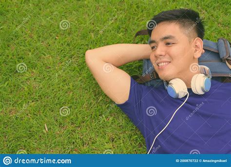 Young Handsome Asian Man Relaxing At The Park Stock Photo Image Of