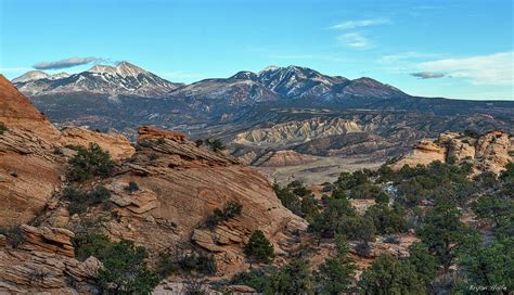 La Sal Mountains From Behind The Rocks Moab Utah Photograph By Bryan