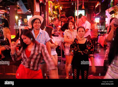 Thailand Pattaya Beach Resort And Centre For Sex Tourism Prostitutes Outside A Bar Photo By